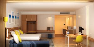 Katil atau katil-katil dalam bilik di Pollos Hotel & Gallery