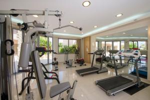 a gym with several treadmills and exercise equipment at Isida Hotel Agia Marina in Agia Marina Nea Kydonias