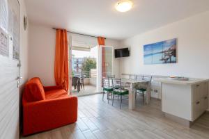 A television and/or entertainment centre at Ionio apartment