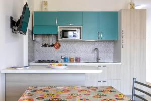 Kuchyňa alebo kuchynka v ubytovaní Tirreno apartment