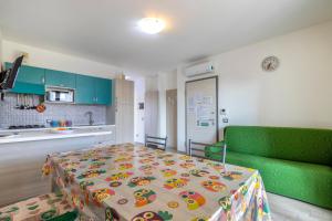 Kuchyňa alebo kuchynka v ubytovaní Tirreno apartment
