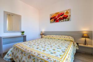 Posteľ alebo postele v izbe v ubytovaní Tirreno apartment