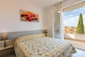 Posteľ alebo postele v izbe v ubytovaní Tirreno apartment