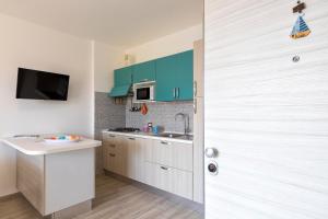 Kuchyňa alebo kuchynka v ubytovaní Tirreno apartment