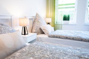 Postel nebo postele na pokoji v ubytování Blick über Dresden