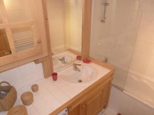 a bathroom with a sink and a shower at Appartement La Clusaz, 5 pièces, 8 personnes - FR-1-304-40 in La Clusaz