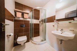 Kúpeľňa v ubytovaní Hotel Hubertus