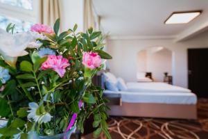 Posteľ alebo postele v izbe v ubytovaní Hotel Hubertus