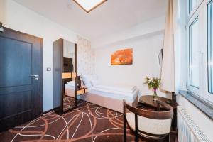 Posteľ alebo postele v izbe v ubytovaní Hotel Hubertus