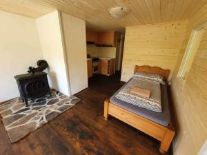 Posteľ alebo postele v izbe v ubytovaní Palčovka - apartmán U Štěpána a U Dorotky