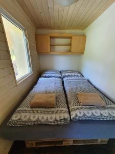 Postel nebo postele na pokoji v ubytování Palčovka - apartmán U Štěpána a U Dorotky