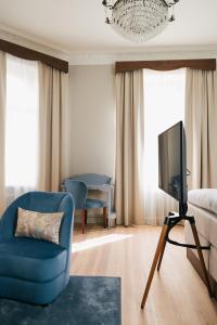 TV a/nebo společenská místnost v ubytování Hotel Ruth, WorldHotels Crafted