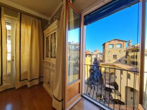 a balcony with a view of a city at Hotel Balestri - WTB Hotels in Florence