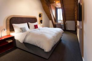 Letto o letti in una camera di KONCEPT HOTEL Löie