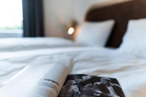 Letto o letti in una camera di KONCEPT HOTEL Löie