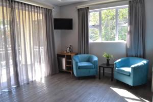 Χώρος καθιστικού στο Golf Course Boutique Guesthouse