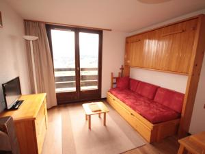 Appartement Les Saisies, 3 pièces, 6 personnes - FR-1-293-65にあるシーティングエリア