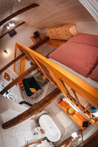 an overhead view of a bedroom with a bunk bed at Chalets Dedinky in Dedinky