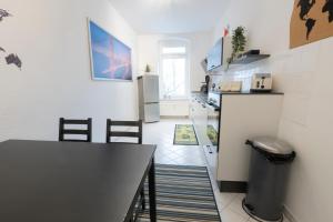 Dapur atau dapur kecil di Lutherviertel-Apartment mit 2 SZ in Uni-Nähe