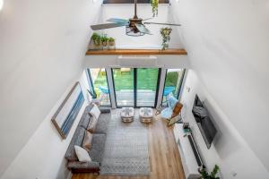 an overhead view of the living room of a house at Unique A-frame Tiny House in Houston Central in Houston