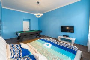 Postel nebo postele na pokoji v ubytování Apartman Exclusive Prague Whirlpool