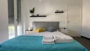 Кровать или кровати в номере CasaBlanco