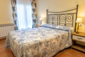 Postel nebo postele na pokoji v ubytování Casa El Puente