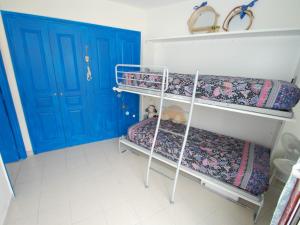Двухъярусная кровать или двухъярусные кровати в номере Appartement Menton, 2 pièces, 4 personnes - FR-1-196-280