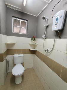 a bathroom with a toilet and a shower at Dream 1 in Cameron Highlands +24 photos