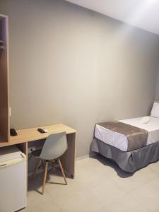 Llit o llits en una habitació de Unity Hotel - Vila Mariana SP