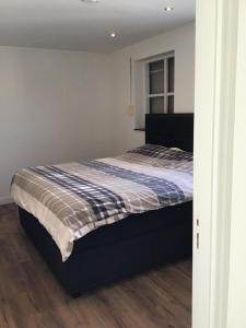 Postel nebo postele na pokoji v ubytování Chic appartement in Sas van Gent