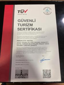 een bord voor een Duitse autodealer met een autodealer bij Peracity Hotel in Ankara