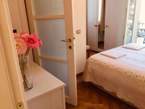 Кровать или кровати в номере Villa Varenna