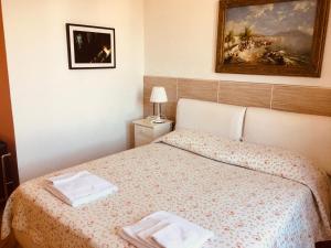 Кровать или кровати в номере Villa Varenna