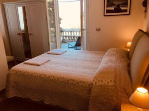 Кровать или кровати в номере Villa Varenna