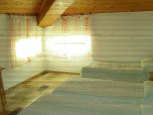 Katil atau katil-katil dalam bilik di Albergo Drena