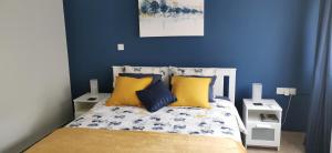 Ένα ή περισσότερα κρεβάτια σε δωμάτιο στο Elegant & Trendy Apt in a Peaceful Area