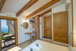 Postel nebo postele na pokoji v ubytování B&B Il Nespolo