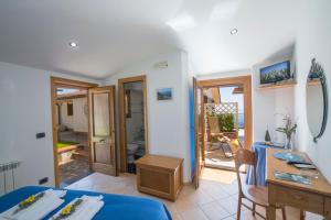 Postel nebo postele na pokoji v ubytování B&B Il Nespolo