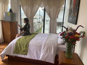 Voodi või voodid majutusasutuse Loreto hotel toas