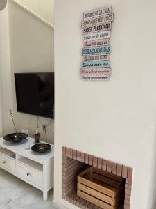 Telewizja i/lub zestaw kina domowego w obiekcie CASA BAIANA - Dúplex en Costa Ballena