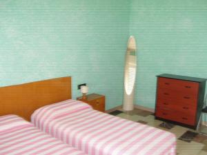 Katil atau katil-katil dalam bilik di Albergo Drena