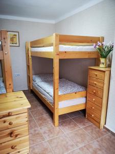 Postel nebo postele na pokoji v ubytování Dráchovský apartmán a vejminek