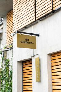 Majutusasutuses Zentrico Boutique olev sertifikaat, autasu, silt või muu dokument