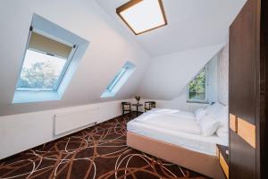 Posteľ alebo postele v izbe v ubytovaní Hotel Hubertus