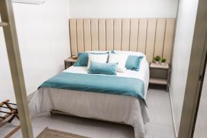 Voodi või voodid majutusasutuse Zentrico Boutique toas