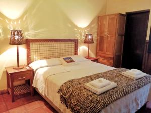 Katil atau katil-katil dalam bilik di Santa Maria Hotel