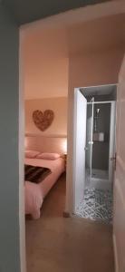 Ένα ή περισσότερα κρεβάτια σε δωμάτιο στο Au Coeur de Prémanon +34 φωτογραφίες