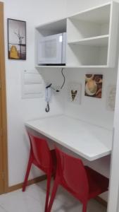 Kuchyň nebo kuchyňský kout v ubytování Flat Smart 401-Frente a praia-com self-check-in.