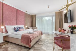 Postel nebo postele na pokoji v ubytování Golden Line Apartments + 41 fotografií